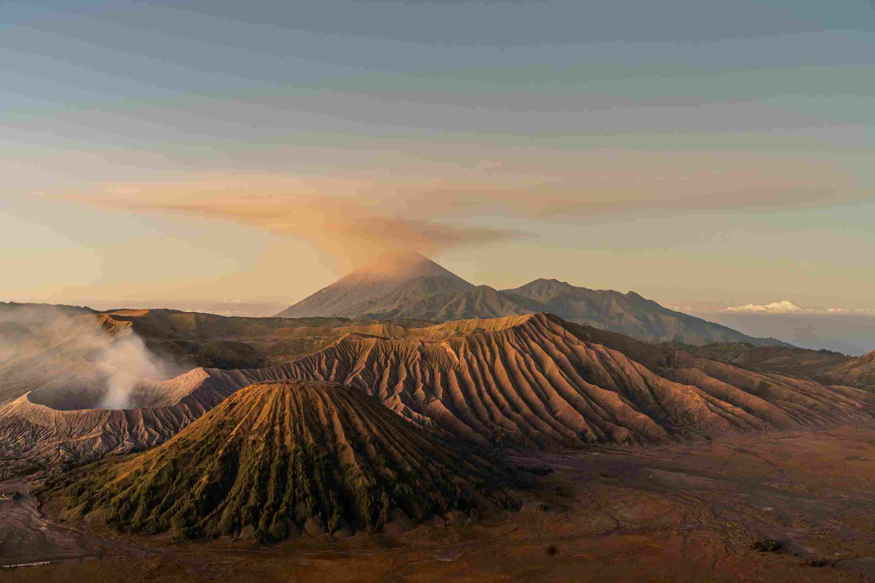 A breathtaking sunrise over Mount Bromo in Indonesia, showcasing vibrant colors and dramatic volcanic landscapes.