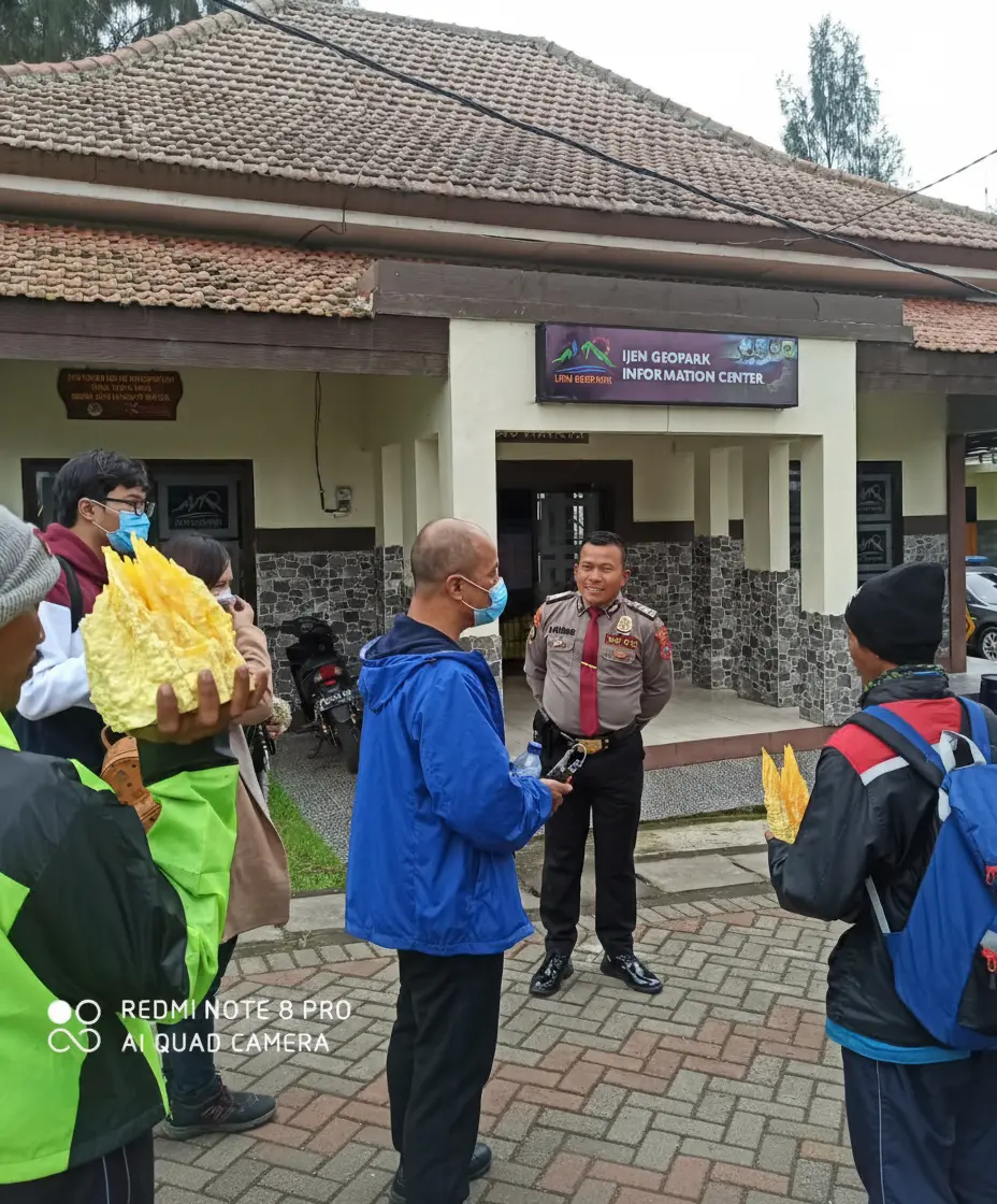 Preview: Tourist Police briefing at Ijen Geopark Information Center with local miners present.